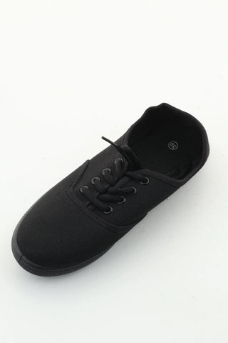 Schwarze Turnschuhe