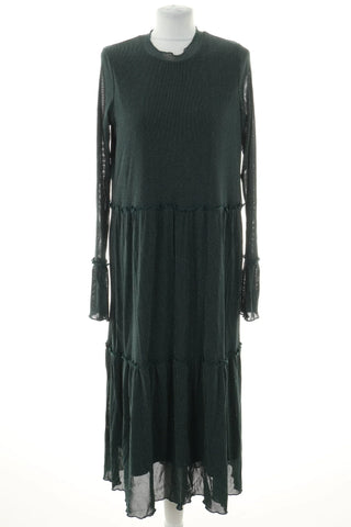 Grünes glänzendes Kleid