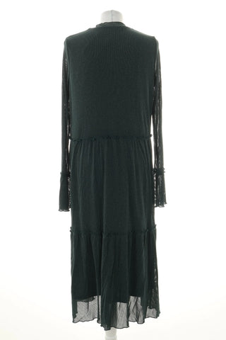 Grünes glänzendes Kleid