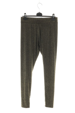 Goldene glänzende Leggings