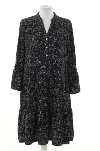 Schwarzes Kleid mit Punkten