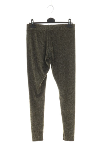 Goldene glänzende Leggings