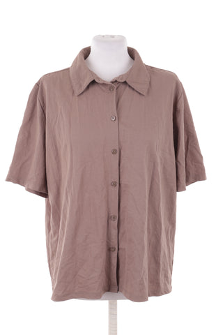 Beigefarbene Bluse