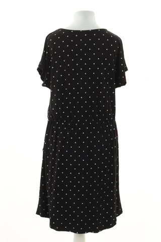 Schwarzes Kleid mit Punkten