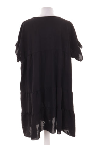 Schwarzes Kleid