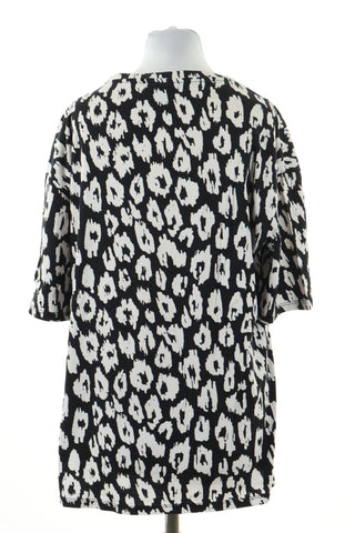 Schwarze Bluse mit Tupfen